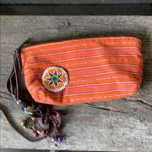 JADEtribe beaded orange clutch